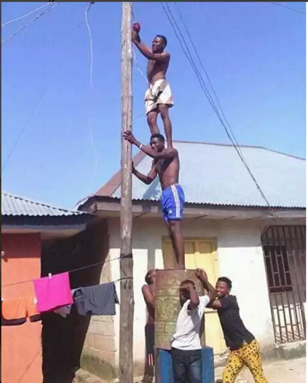 OMG!! This Is Funny:??? See How This Men Devised To Reconnect An Electric Wire (Photo)